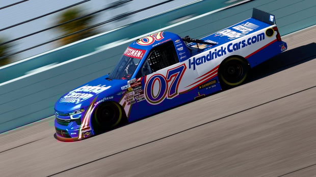 An image of Kyle Larson driving in the NASCAR Truck Series