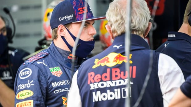 Max Verstappen talking with Helmut Marko