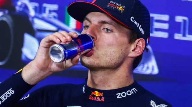 Verstappen drinking a Red Bull