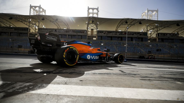 Lando Norris driving out of the pitbox. — Photo: © LAT Images
