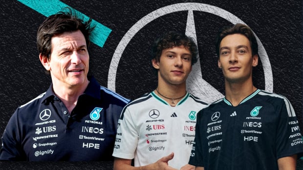 Toto Wolff looks at his drivers George Russell and Kimi Antonelli to a Mercedes logo background