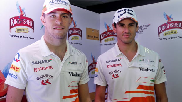 Paul Di Resta and Adrian Sutil pose for a picture in 2013 — Photo: © IMAGO