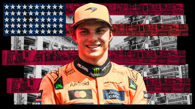 Piastri smiling in McLaren team kit in front of US flag-themed background