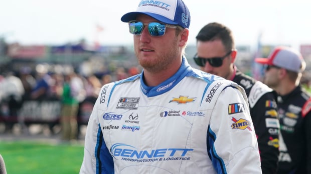 An image of NASCAR driver Austin Hill looking into the distance