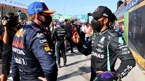 Verstappen talking with Hamilton