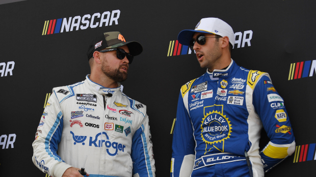 An image of NASCAR drivers Ricky Stenhouse Jr and Chase Elliott in discussion