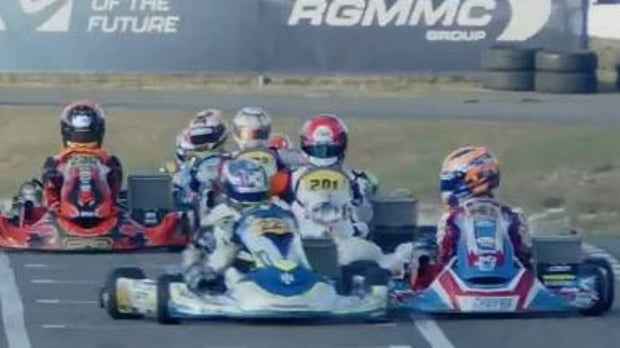 Two racers crash together in a karting race