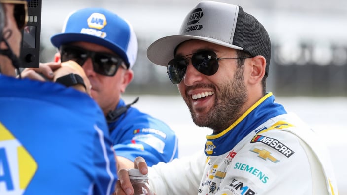 An image of NASCAR driver Chase Elliott smiling