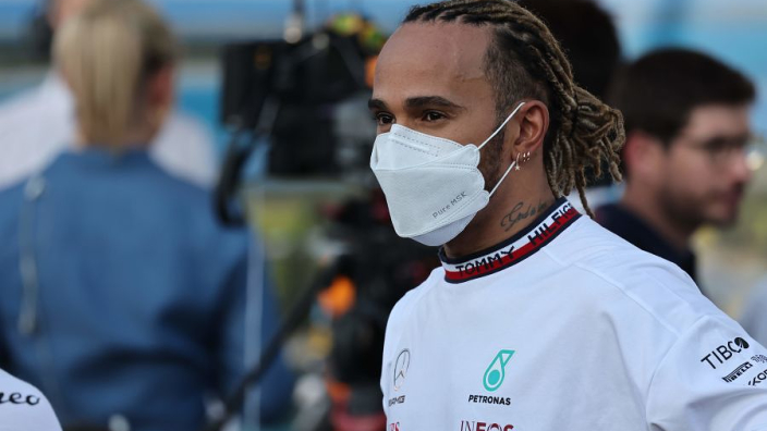 Hamilton vows to defy FIA jewellery ban - or get his ear cut off