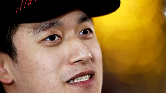 Zhou "speechless" after emotional point-scoring debut