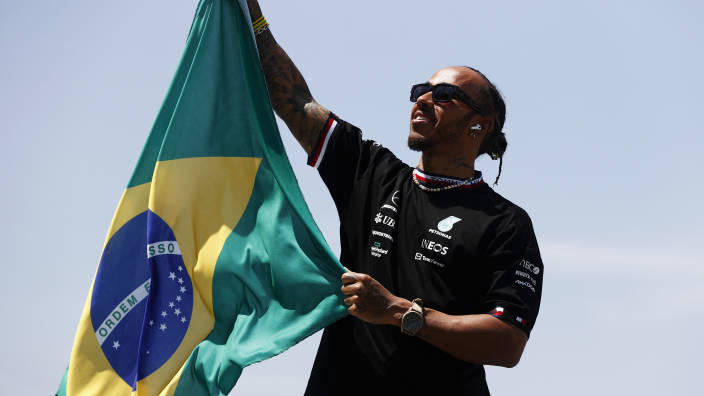 F1 fans ask 'is he single' as Lewis Hamilton rocks up at Brazilian