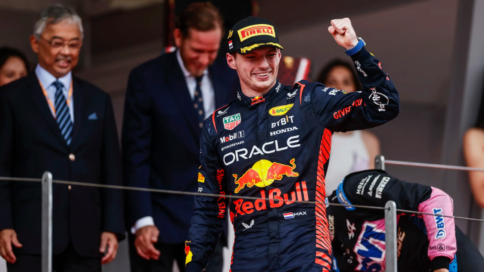 Max Verstappen receives trophy from a bra-less Maria Sharapova in Monaco GP