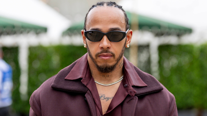 Lewis Hamilton takes a break from F1 pre-season to attend huge fashion show