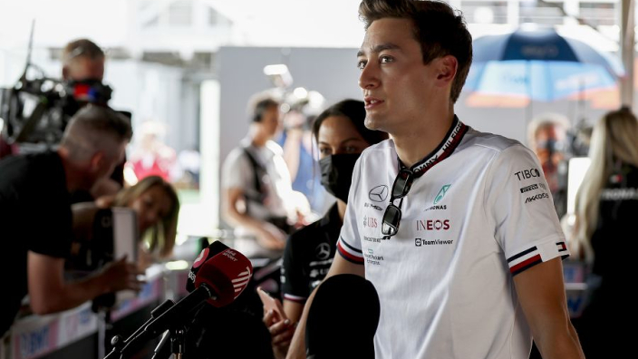 Russell doing "wheelies" around Monaco in super-stiff Mercedes