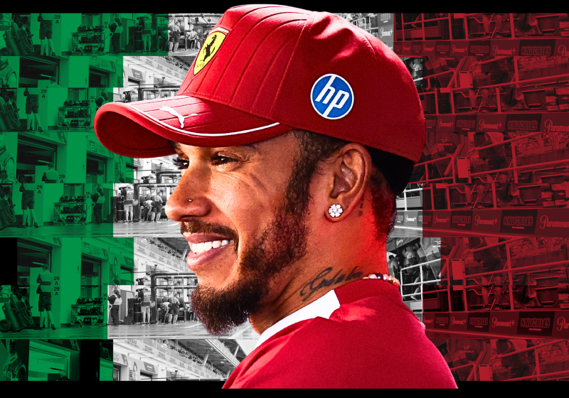 Lewis Hamilton in front of an Italian flag themed background shot of the Italian GP
