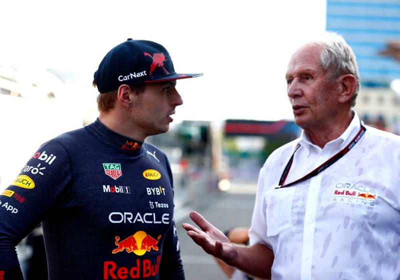 Max Verstappen talking with Dr. Helmut Marko