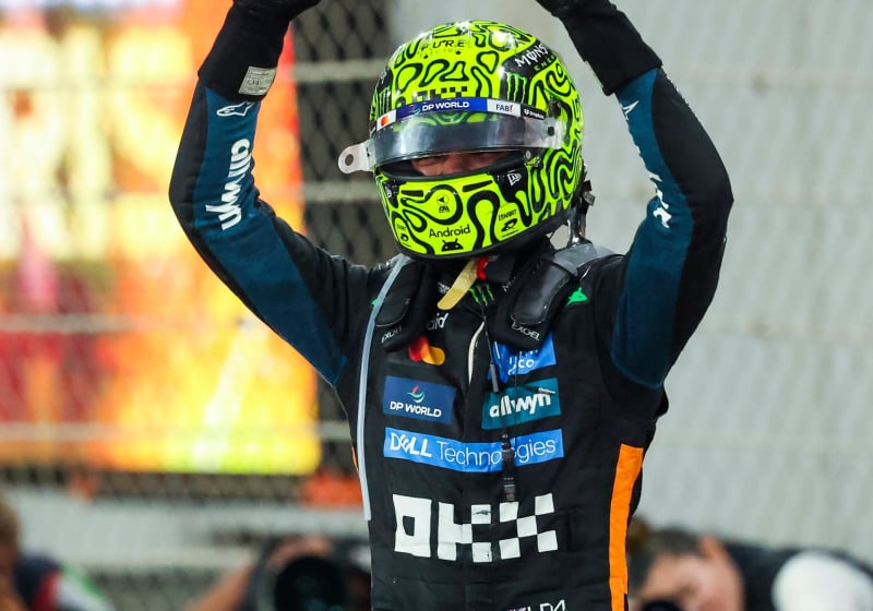Lando Norris celebrating his F1 2025 drivers' championship win at the Abu Dhabi GP