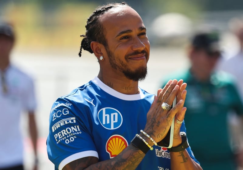 Hamilton looking grateful in blue Ferrari kit at Italian GP