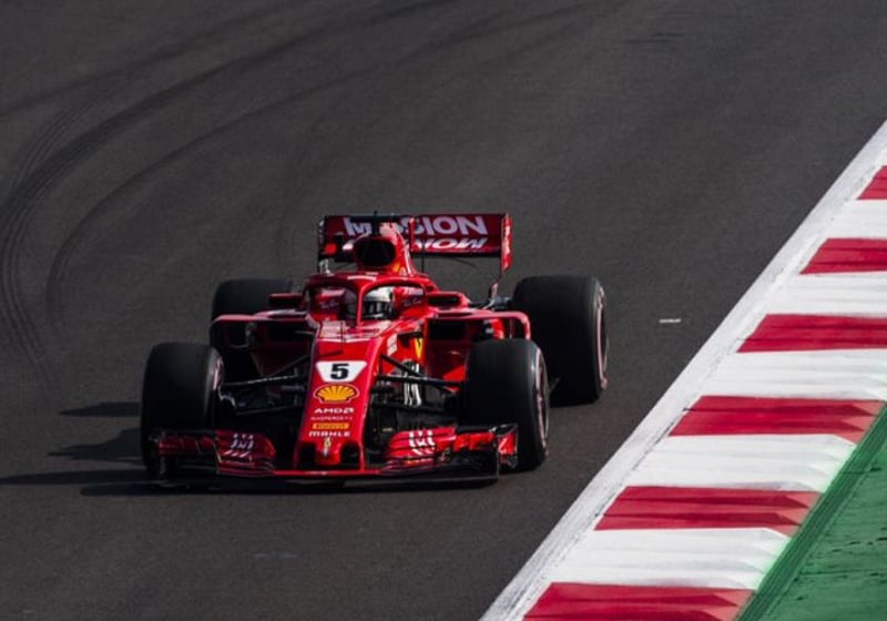 Vettel clutches at Red Bull wipeout as title hopes fade