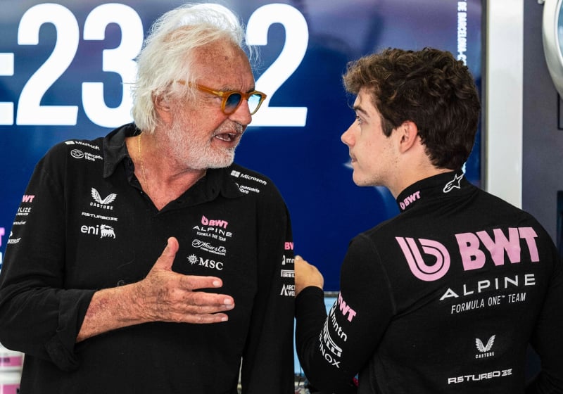 Briatore and Colapinto in deep conversation in the Alpine garage