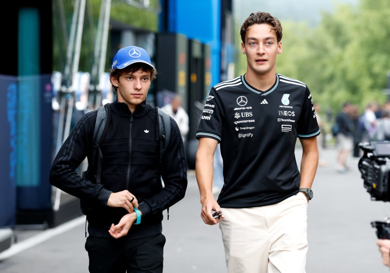 An image of Mercedes F1 drivers Kimi Antonelli and George Russell in the paddock at the 2025 Belgian GP