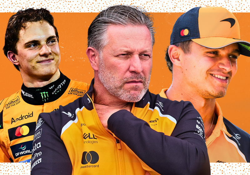 A straight faced Zak Brown is flanked by a smiling Oscar Piastri and Lando Norris
