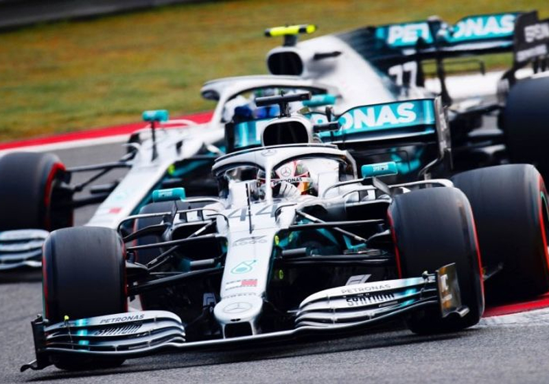 Hamilton takes championship lead after Ferrari farce in China