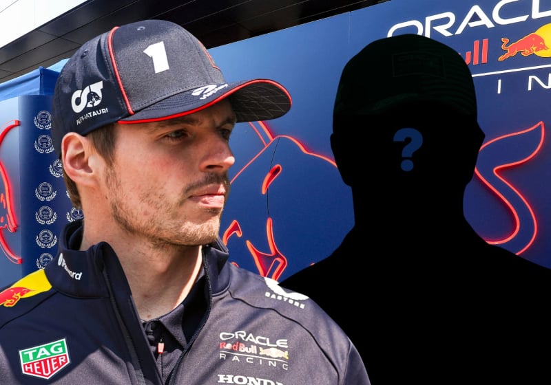 Verstappen looking on at a mystery driver shadow a question mark over his body in front of the Red Bull motorhome