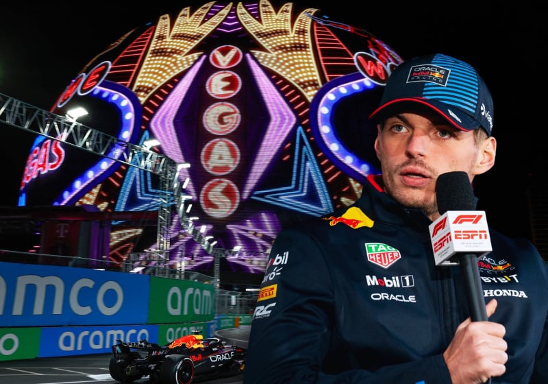 Verstappen looking shocked with a microphone in hand in front of a picture of a Red Bull on track below the Vegas sphere at night