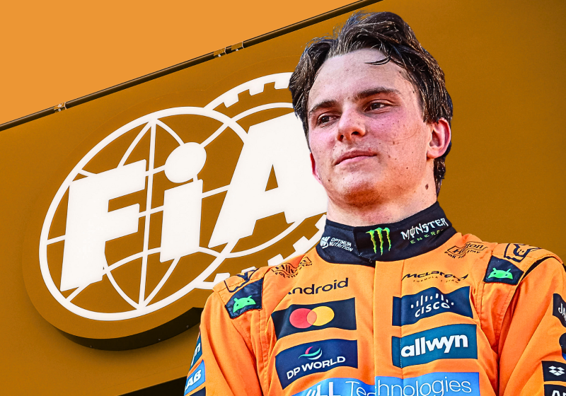 Oscar Piastri in front of the FIA flag