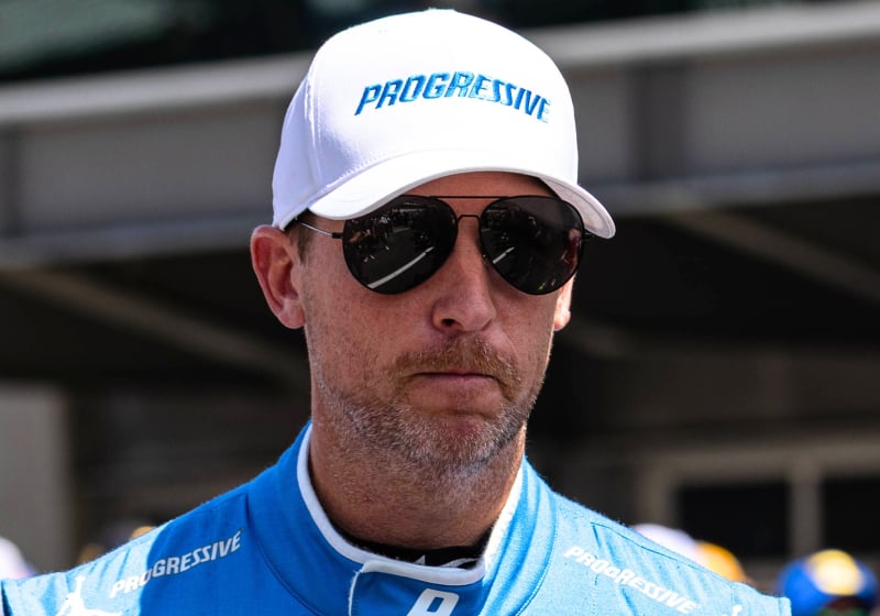 An image of NASCAR Cup Series star Denny Hamlin looking unhappy