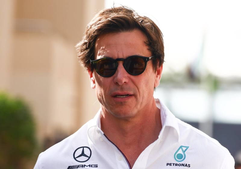 Toto Wolff angrily walks on wearing sunglasses