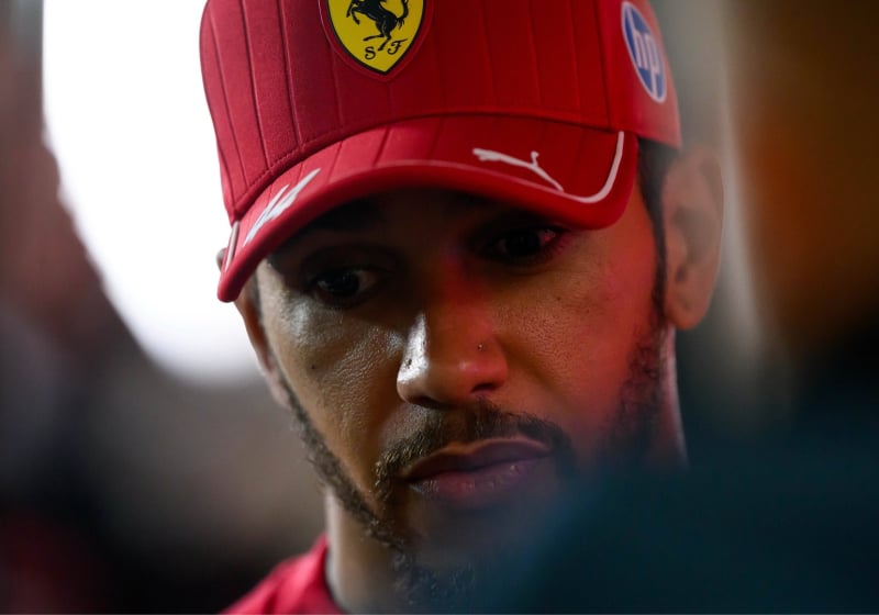 Lewis Hamilton looking downcast at the Qatar Grand Prix