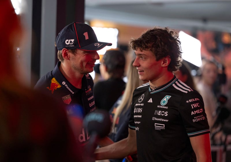 Max Verstappen talking to Kimi Antonelli in Qatar