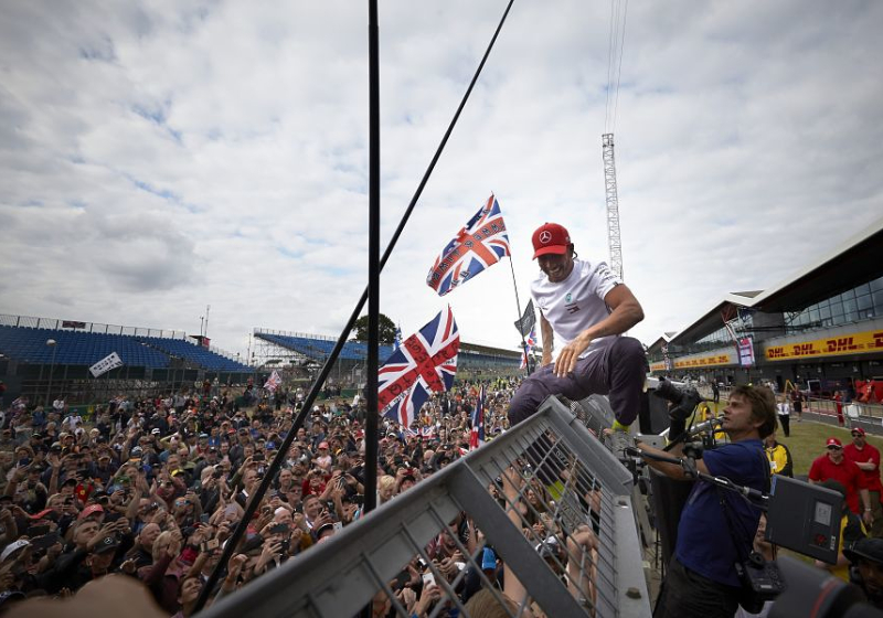 Hamilton "split" on "premature" British GP full-house crowd