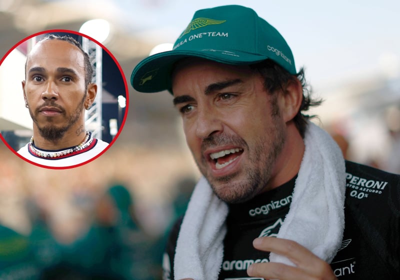 Fernando Alonso speaks angrily into a microphone as Lewis Hamilton looks on glumly