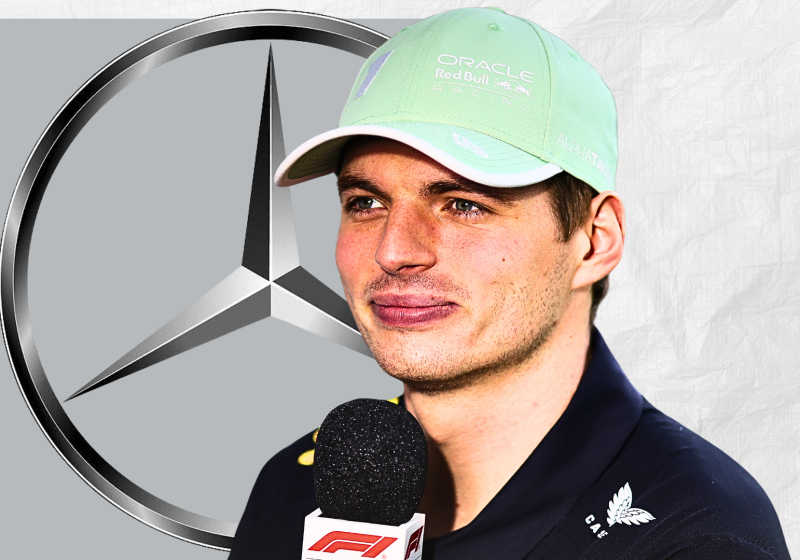 Max Verstappen looking happily at a Mercedes logo