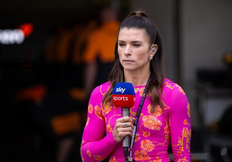 Danica Patrick holds a Sky Sports F1 mic