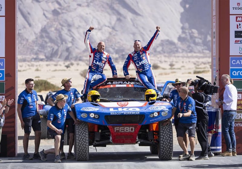 Tim and Tom Coronel on the starting podium for Dakar