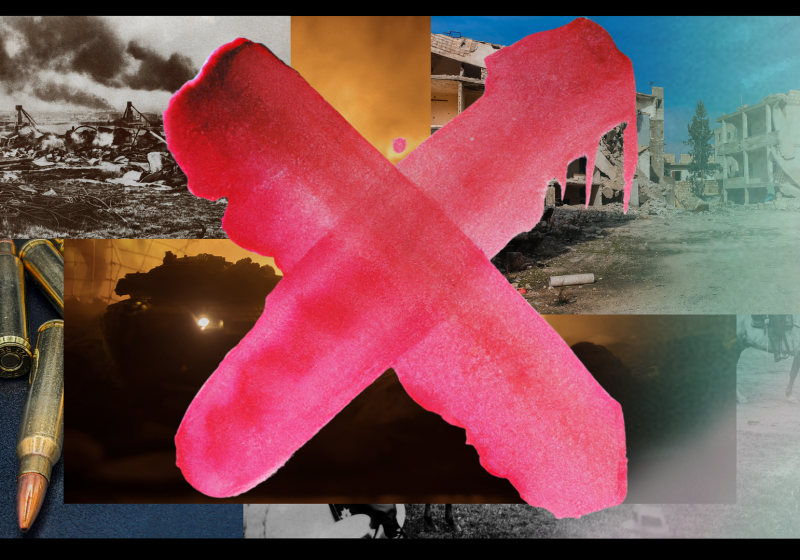 A spray-painted X in front of a series of war zones