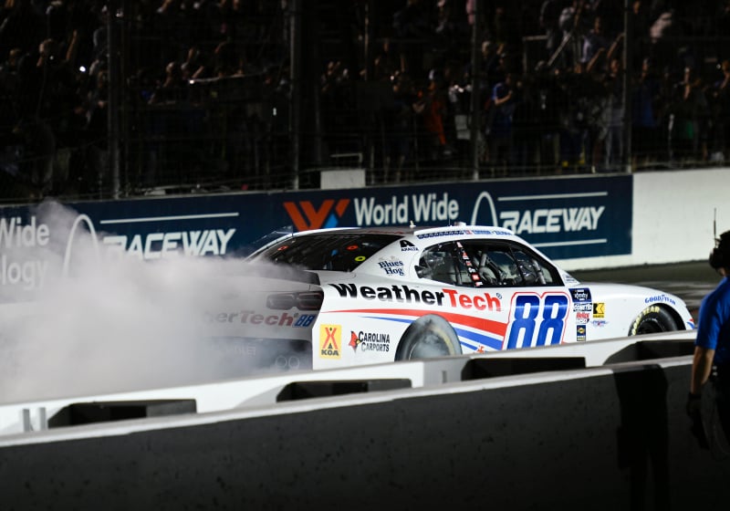An image of NASCAR driver Connor Zilisch celebrating his win at Gateway