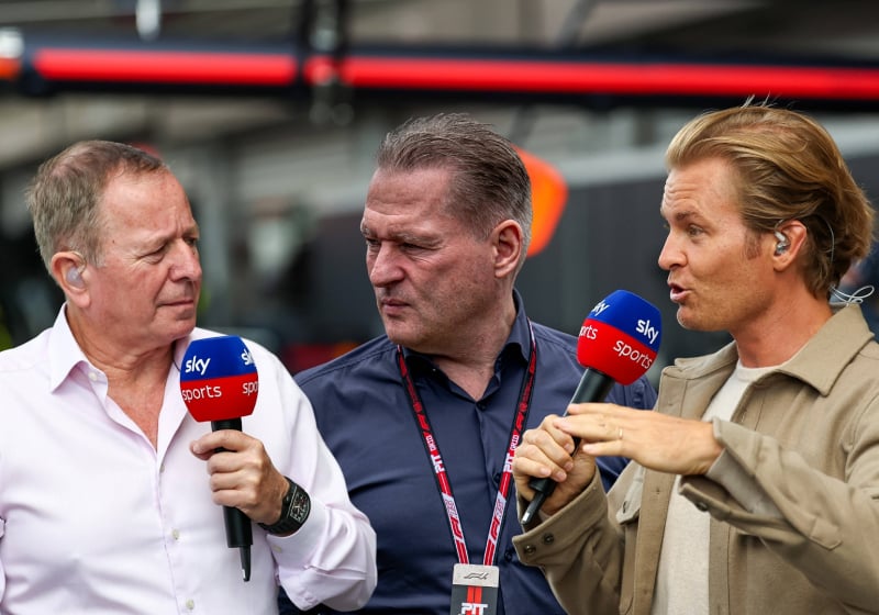 Nico Rosberg and Martin Brundle on an F1 gridwalk with Jos Verstappen between them