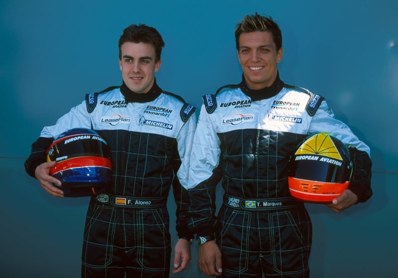 Fernando Alonso stands with Tarso Marques at a Minardi 2001 launch