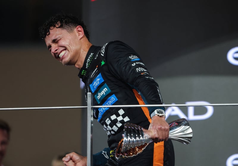 Lando Norris celebrated his F1 title win on the podium at the Abu Dhabi GP