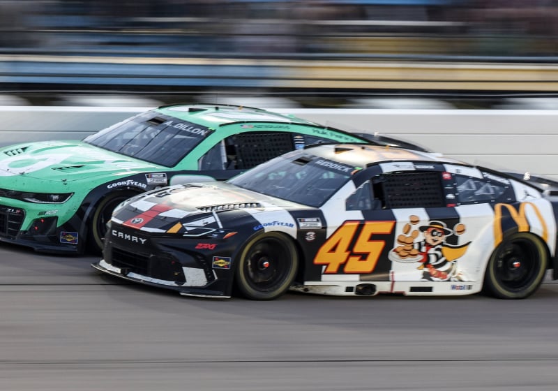 An image of Tyler Reddick and Austin Dillon racing at Iowa Speedway