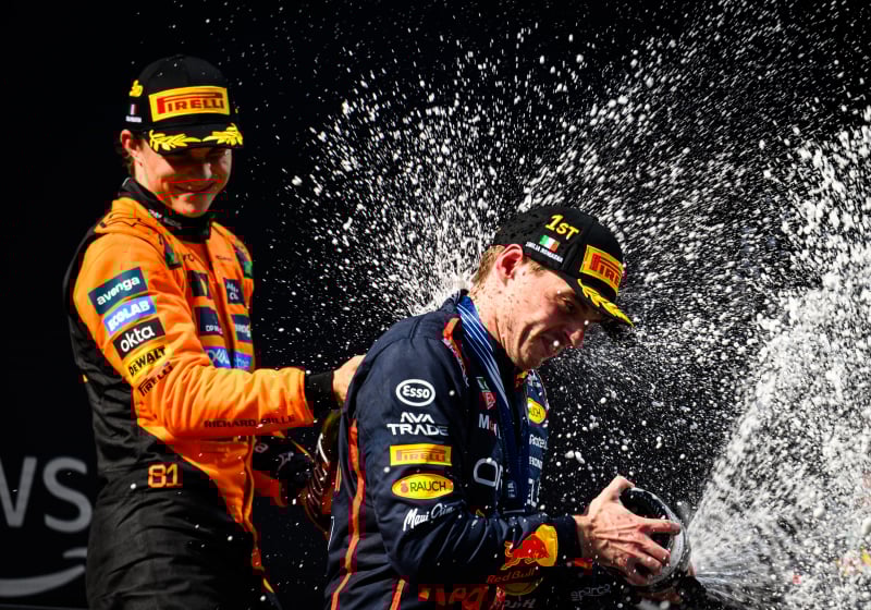 Verstappen and Piastri spray champagne in Imola