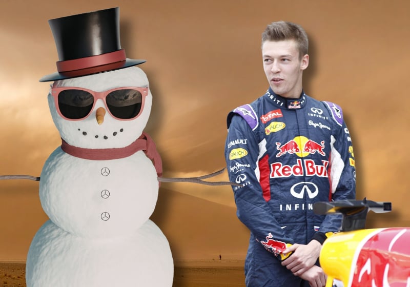 Daniil Kvyat is shown next to a snowman to the backdrop of a sandstorm