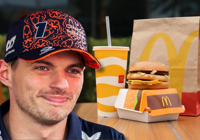 Max Verstappen is cropped smiling at a McDonalds meal in a restaurant