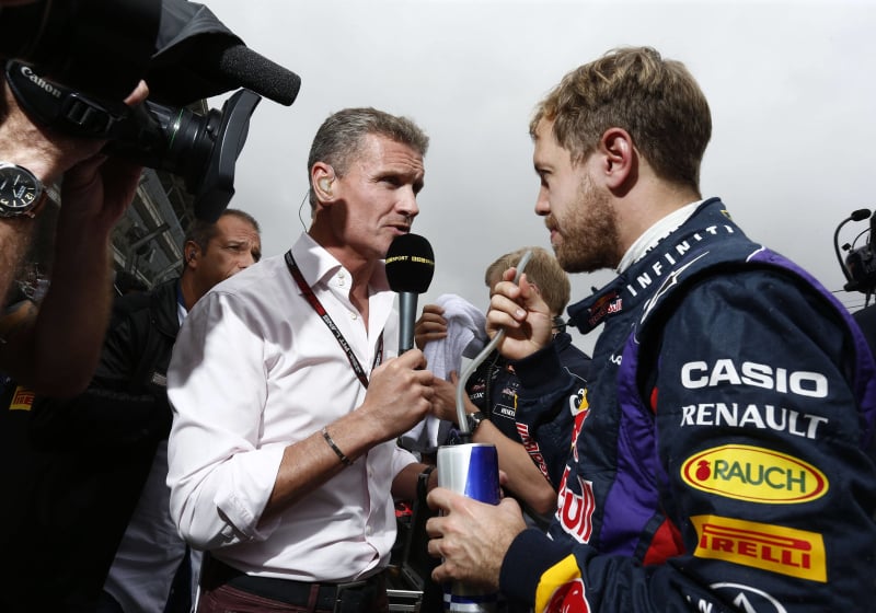 David Coulthard speaks to Sebastian Vettel on the F1 grid