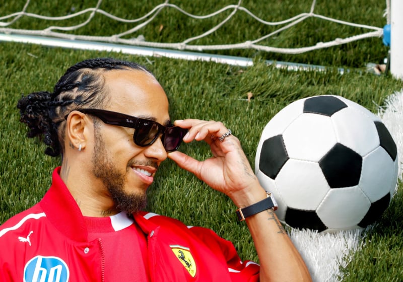 Lewis Hamilton looks at a football in a composite picture